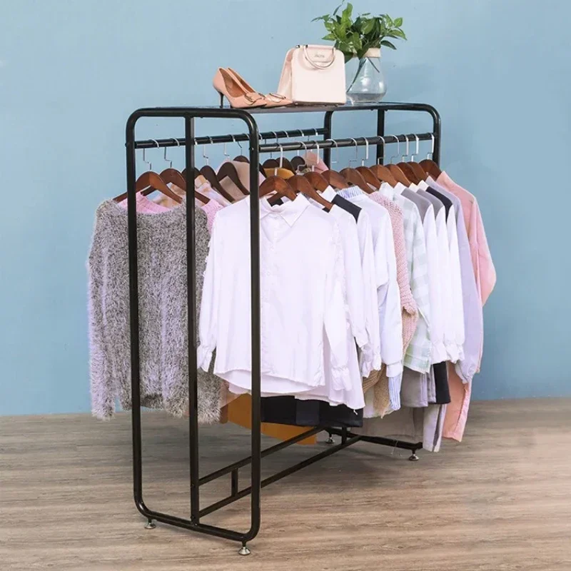Clothing store hangers hangers, floor-to-ceiling middle island racks, side hangs double rows of shelves,  clothing display racks