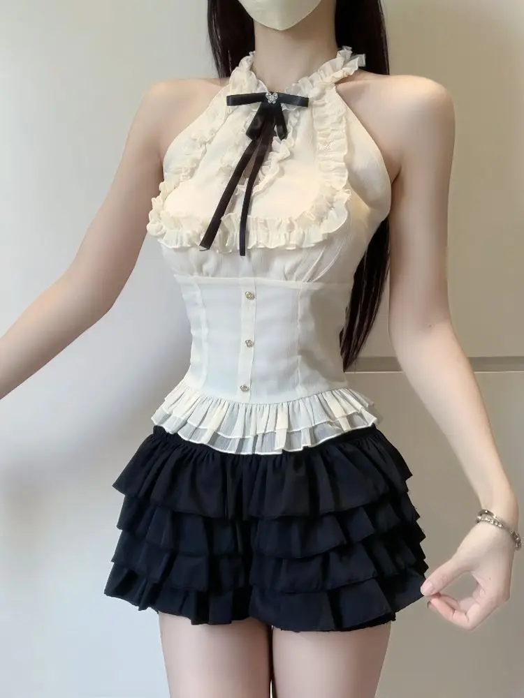 Seksowny, gorący zestaw dwuczęściowy z wycięciami i dekoltem typu slash, elegancki, słodki, nowy komplet damski, modny, ciepły, czarny, krótki spódniczka typu cake.