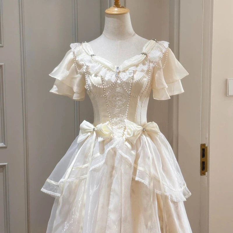Robe d'été en dentelle épissée, Style palais français élégant, avec nœud, nouvelle collection