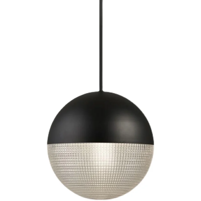 

french style staircase high ceilings dining table ribbed glass metal orb small gold chandelier and pendant light