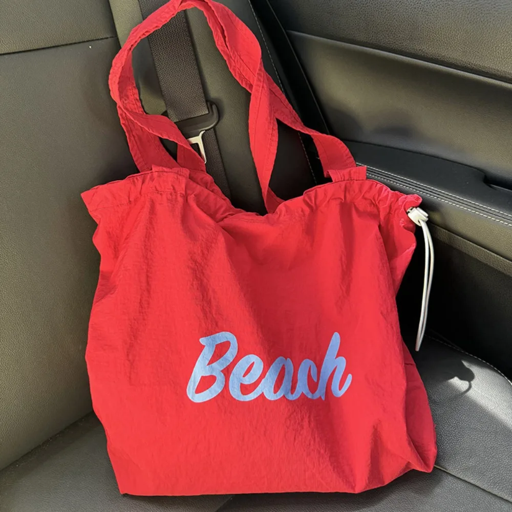 

2025 summer new drawstring canvas bag ins Japanese tote bag commuter tote bag shoulder bag large capacity