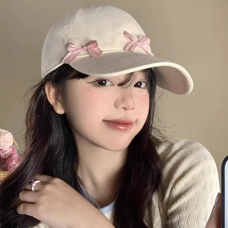 

Корейская повседневная бейсболка свободного кроя с бантом и нашивками, универсальная, солнцезащитная, регулируемая, для женщин, визуально стройнящая лицо