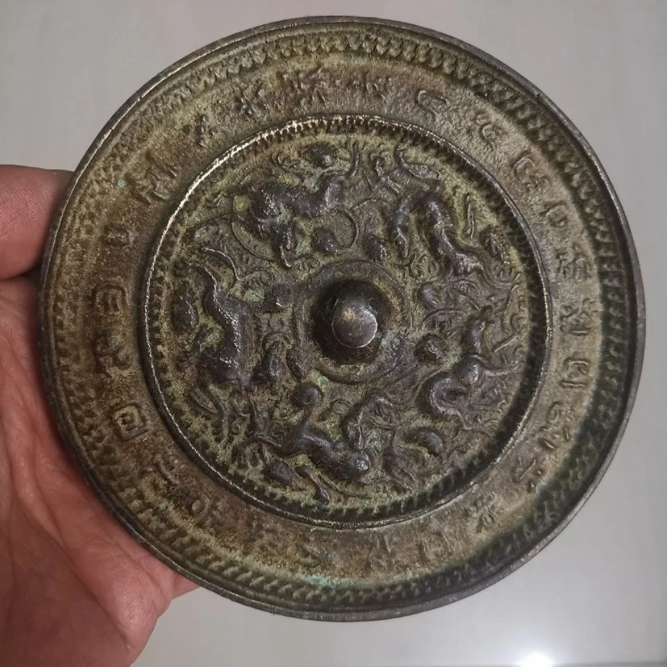 

Home Appreciation of Bronze Mirror in Han and Tang Dynasties with Black Paint and Ancient Circular Inscription of Five Beasts an