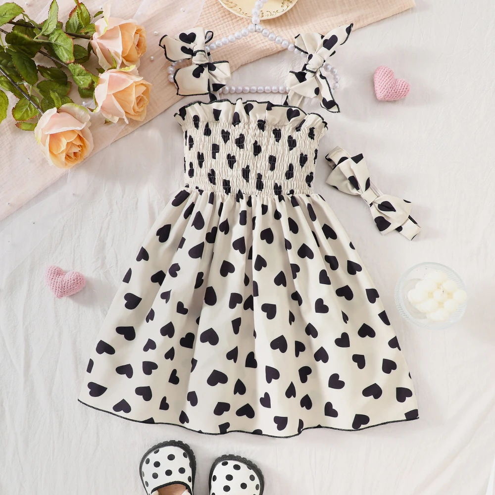 Girls' summer bowknot camisole dress with heart print, ribbed splicing, casual style, and hairband