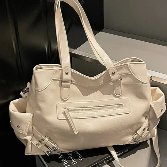 Fashion bag women's 2025 spring and summer new rivet locomotive wind large capacity crossbody shoulder tote bag designer bag