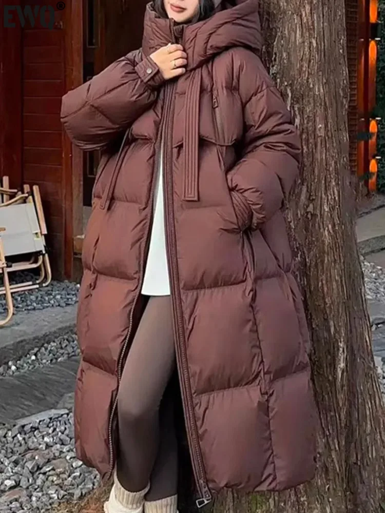 [EWQ] Casual Style Cotton-padded Coat Hooded Ribbon Design Women Winter Keep Warm Mid Length Parkas Overcoats 2024 New 16O3241