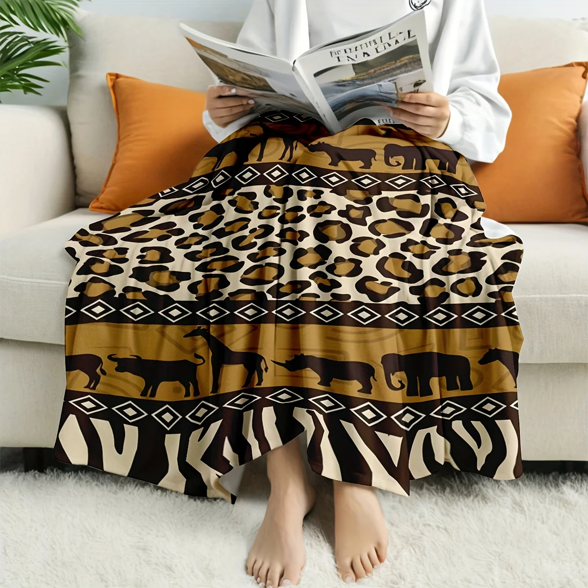 A Fleece Blanket Featuring an African Savanna Theme, Printed with Animals Like Giraffes And Elephants, Along with Leopard And Ze