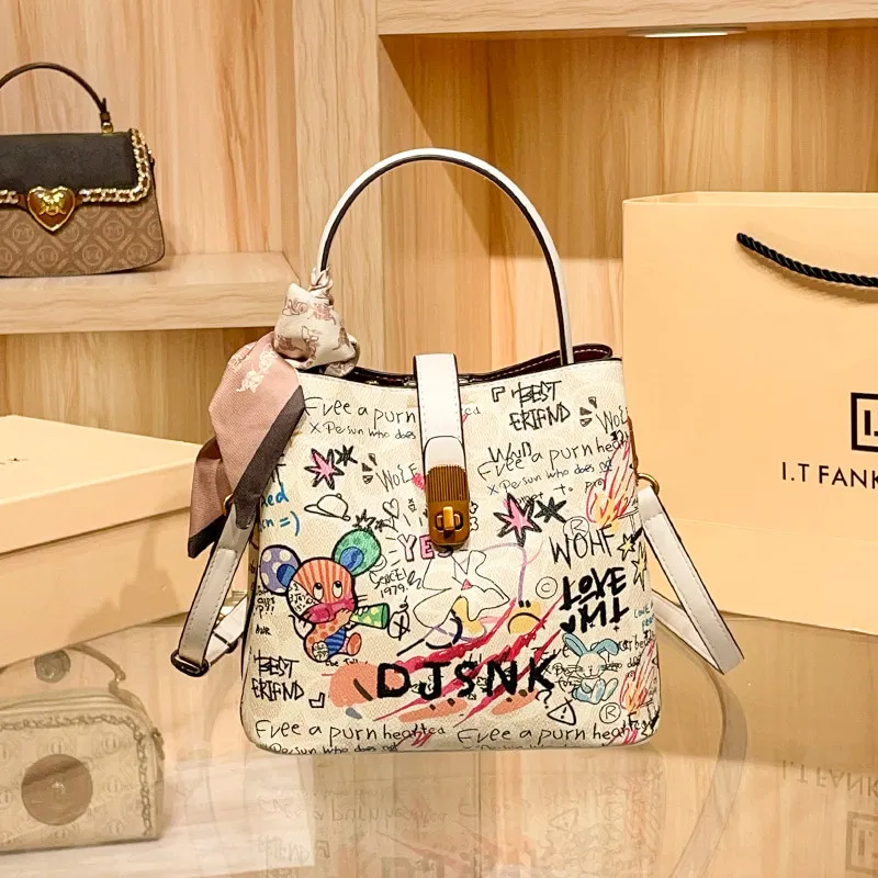 Luxury and Versatile Handheld Bucket Bag with Beautiful Graffiti Design and Scarves Decoration 2026 Women Fashion Crossbody Bag