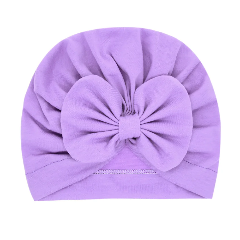 Śliczne Bownot Baby Turban Solid Color dziewczynek chłopców Beanie czapki kapelusz noworodka czapka dla niemowląt czapki elastyczne maluch Headwraps