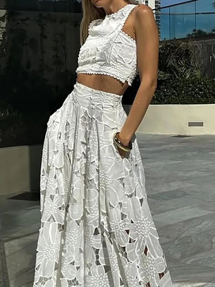 

Красивый модный топ без рукавов с круглым вырезом и длинной юбкой, сексуальный праздничный наряд с открытым пупком, 2025 г., кружевной полый свободный женский комплект из 2 предметов