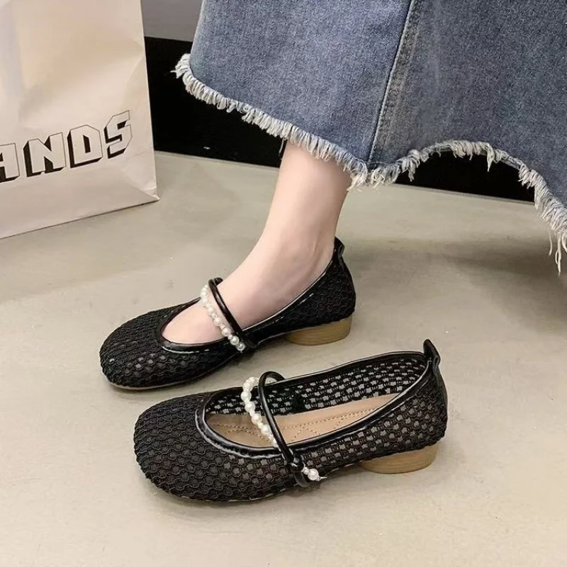 

French-style artistic woven hollow breathable Mary Jane shoes for women2026New Summer Flat Sandals with One Strap