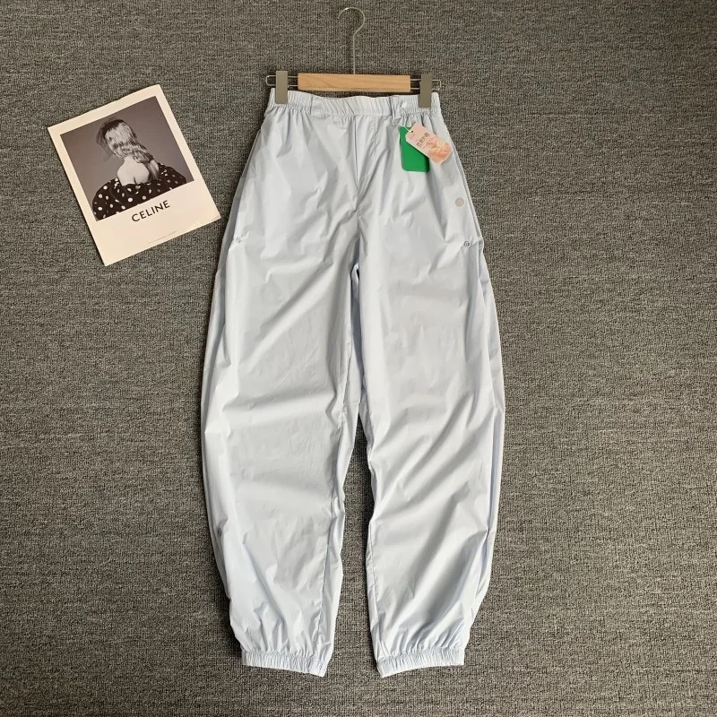 Damskie lekkie spodnie casualowe Qui-Dry, luźny krój, sznurki elastyczne, oddychające spodnie cargo, wysoki stan, detale z nylonu.