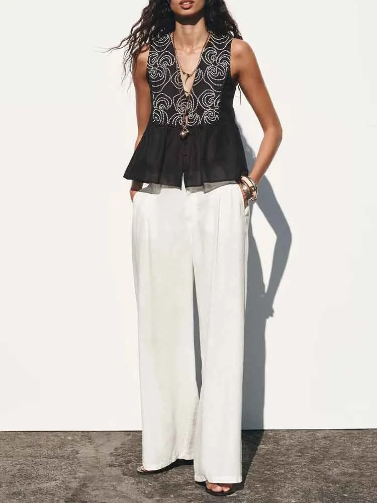 

European style new women's fashion all-match simple solid color sleeveless lace embroidery V-neck shirt