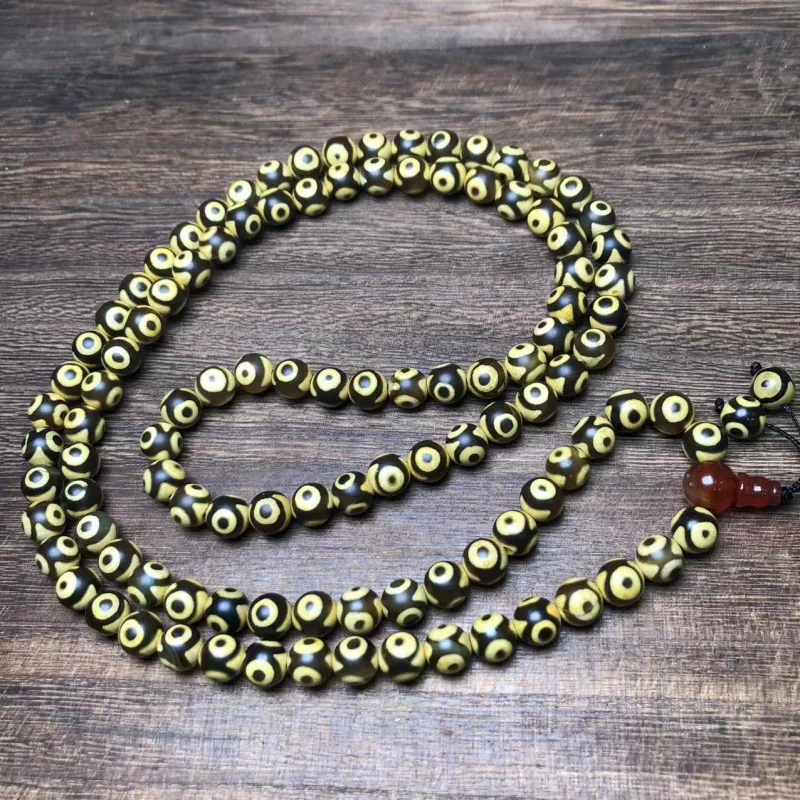 

Wholesale Tibetan Old Agate Three-Eyed Dzi Bead Buddhist Necklace Yellow Tooth Three-Eyed Dzi Bead NecklaceDIYOrnament