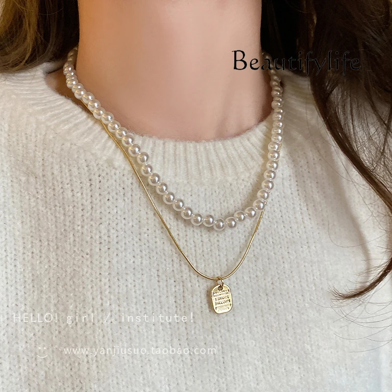 Double-layer stacked pearl sweater chain Women's French necklace Light luxury niche design collarbone chain