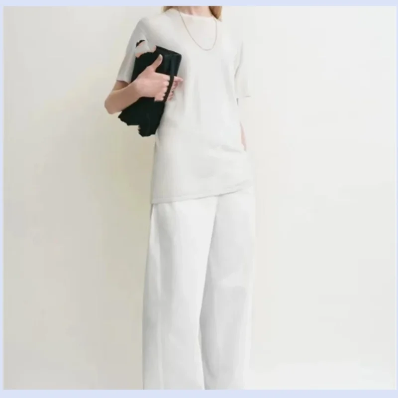 

25 year new women's Nordic minimalist round neck off shoulder semi transparent knitted T-shirt top