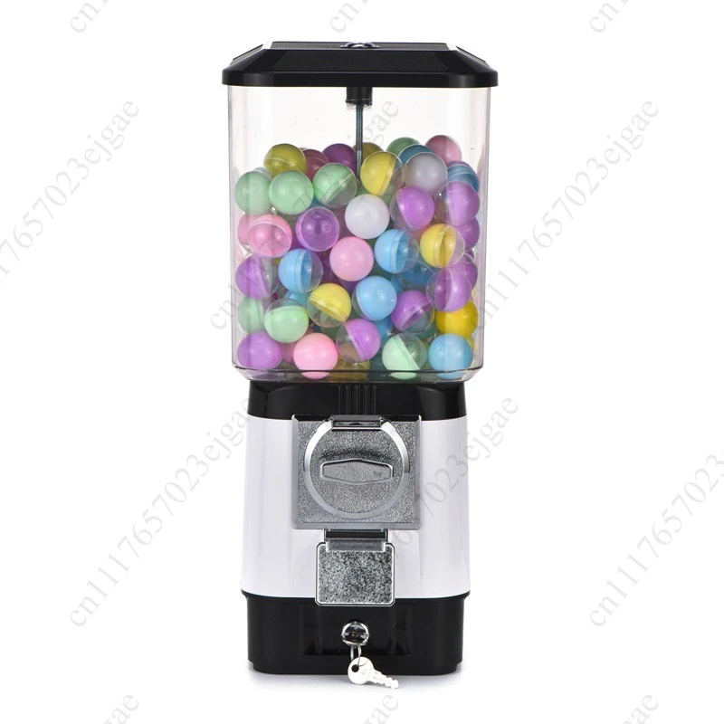 Coin operated egg machine, home candy machine, childhood surprises and memories