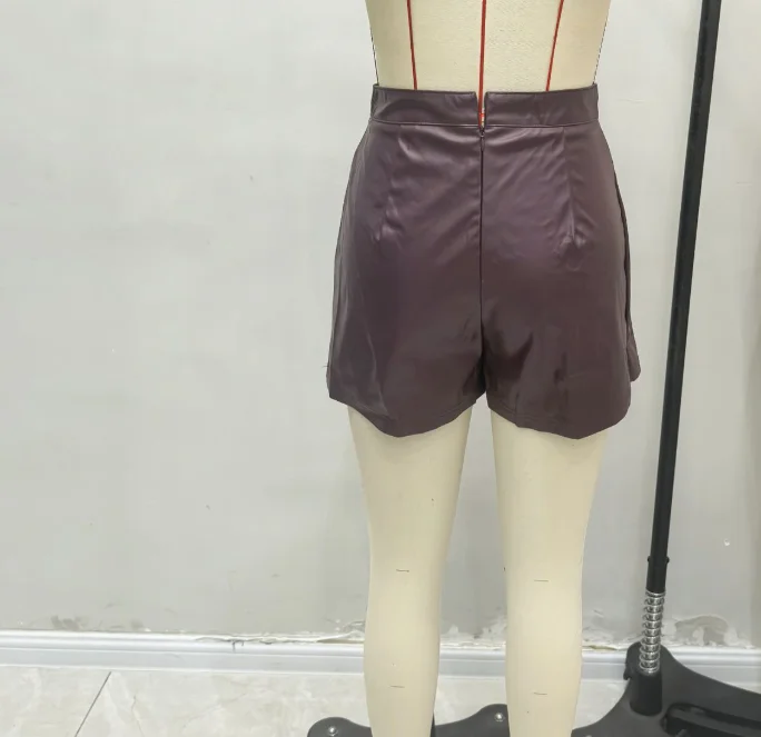 Pantalones cortos de moda de cintura alta para mujer, estilo callejero personalizado, asimétrico, de cuero PU, elásticos, ajustados y sexis, falda de otoño