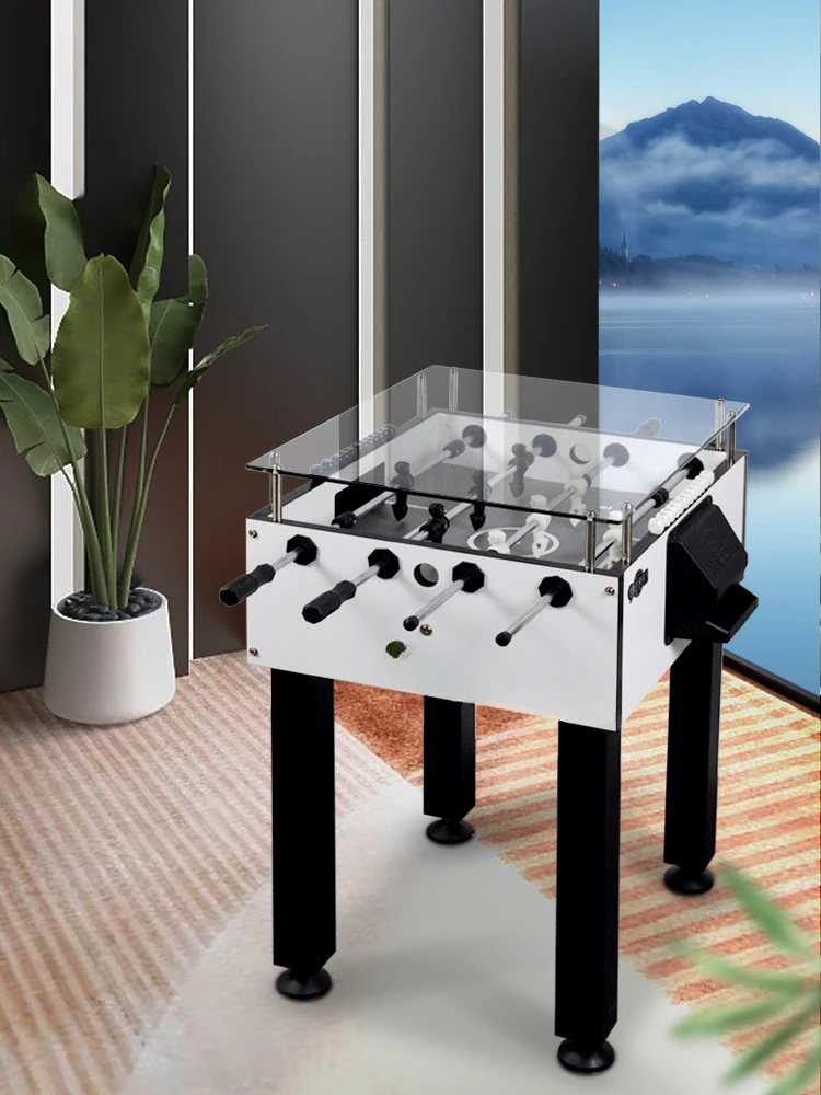 Football machine table style two player game that both adults and children can play