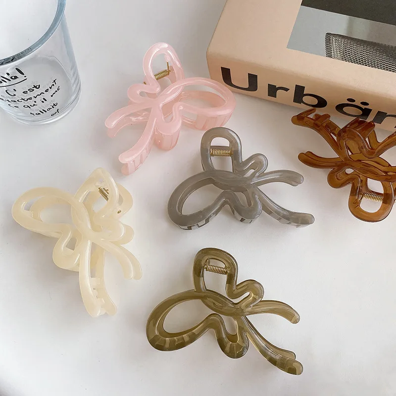 

Jelly Colored Transparent Hollow Bow Design Hair Clip Women Hair Claws Summer Catching Shark Clip Hair Accessories