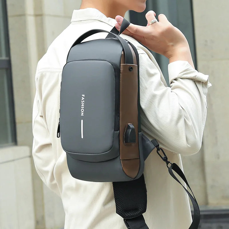 Bolso de pecho para hombre, bandolera impermeable con USB, antirrobo, de viaje, a la moda, novedad