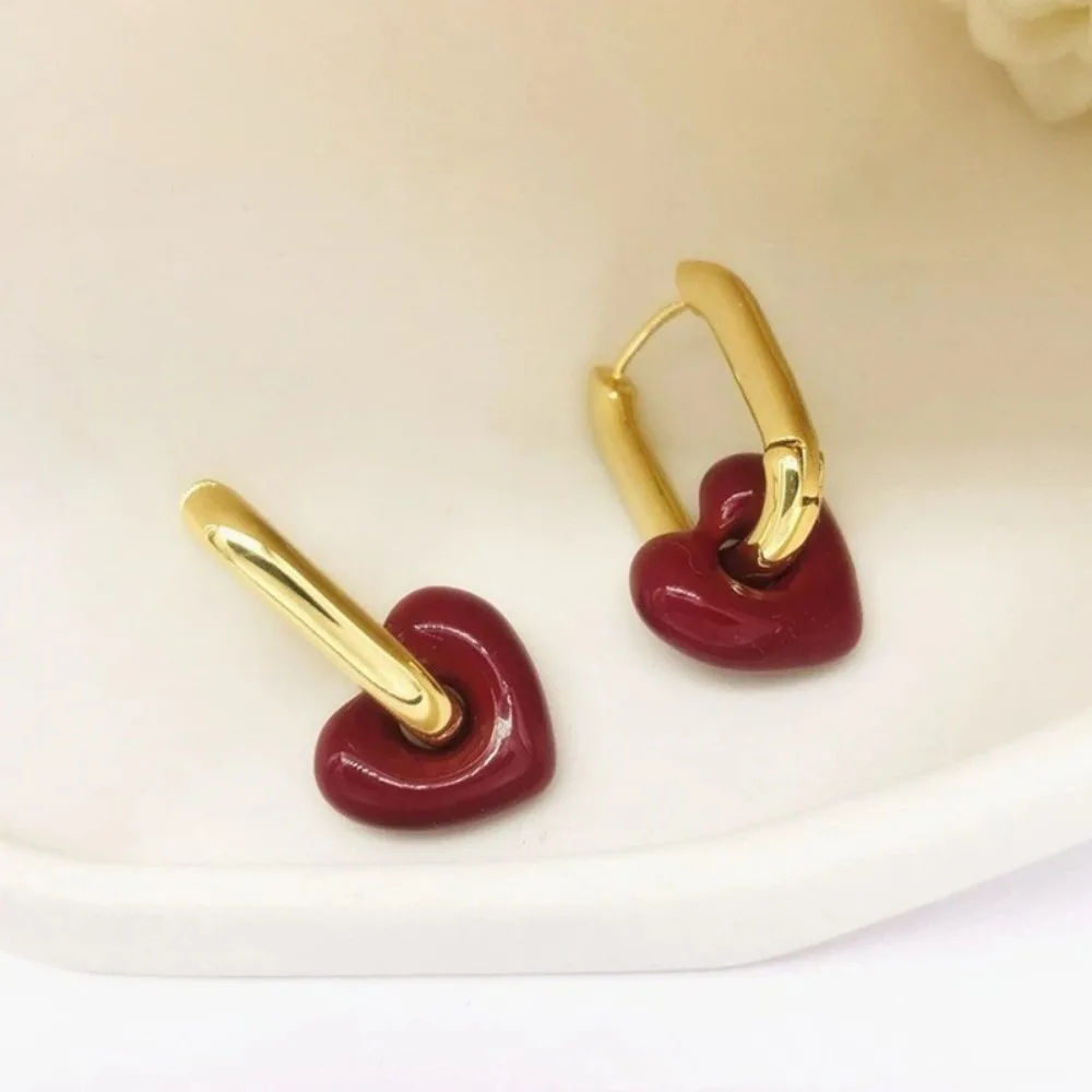 2026 السنة الجديدة الخريف الشتاء الأحمر النفط إسقاط أقراط ، موضة تنوعا الرجعية ضوء الفاخرة مكعب الزركون هوب القرط هدية الكريسماس #6