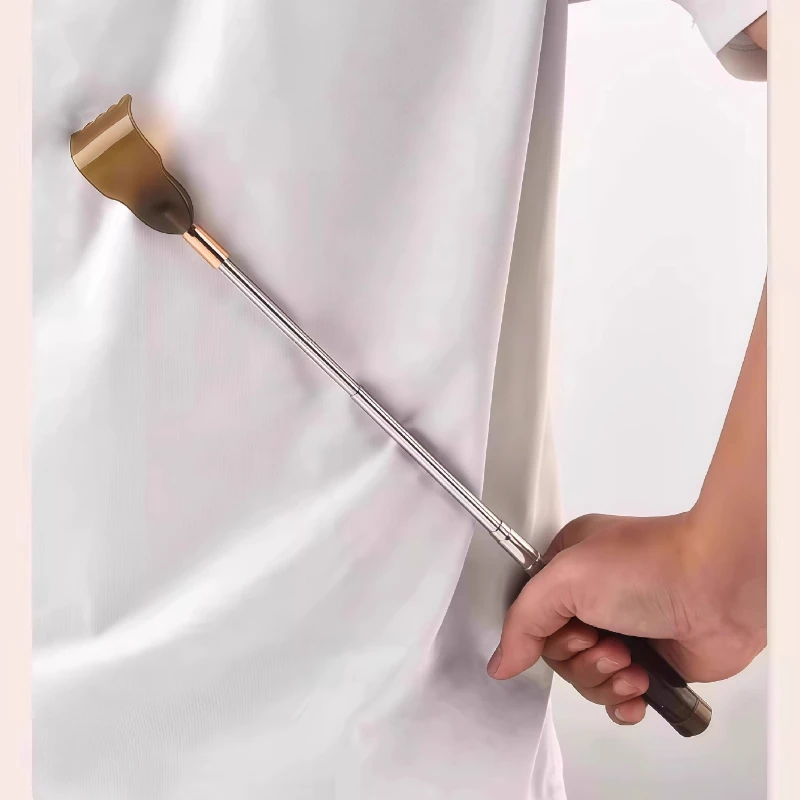 

A multi-functional back and itch scratcher with a retractable rake at the back