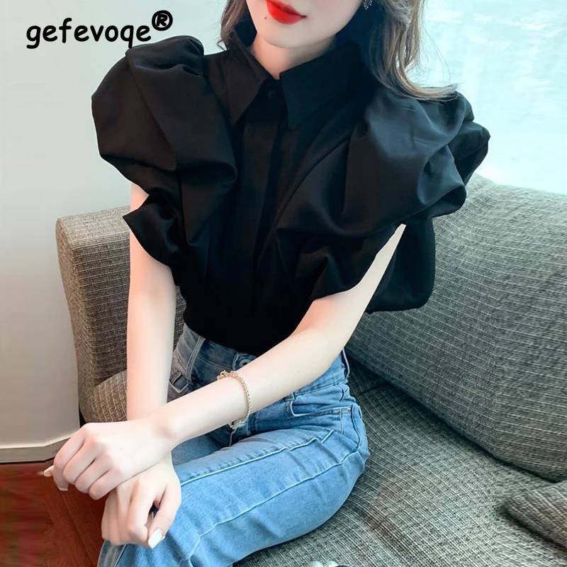 Camicia abbottonata con Design a maniche corte a sbuffo Vintage alla moda da donna elegante camicetta bianca nera dolce elegante con risvolto Casual