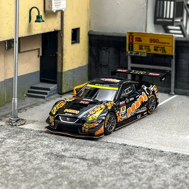 

In stock 1:64 Nissan GT-R NISMO GT3 racing car die-cast alloy car model, boy gift toy, adult collectible ornament.
