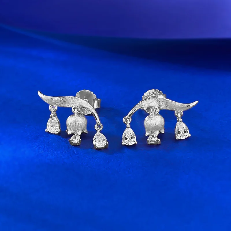 

2025 new white brushed bell orchid tassel earrings with high-end design, cool and elegant live broadcast