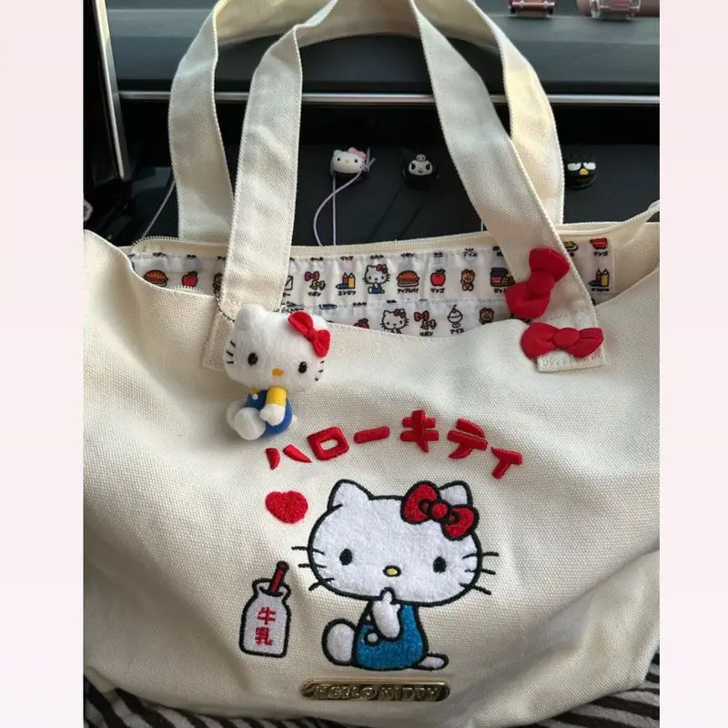 2024 Cute and Sweet Hellokitty Katie Sanrio Cartoon Handheld Girl Student Large Capacity Handheld Bag Summer bag Commuting