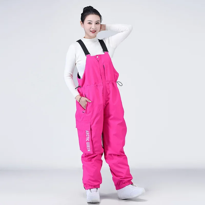 2025 neue solide Winter warme Outdoor Frauen Skihose wind dichte wasserdichte lose Skihose Polyester Sport Schnee Erwachsenen Overalls