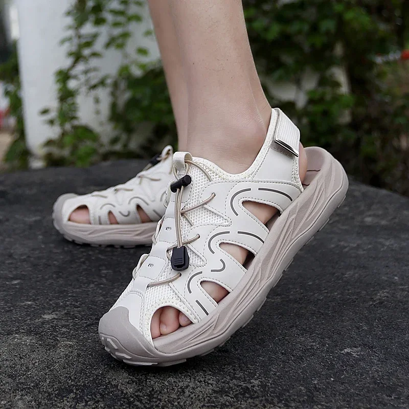 

2025 Summer fashion brand men's comfortable soft soled sandals outdoor new men's breathable hollow out anti slip beach shoes