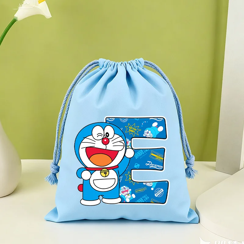

Doraemon Storage Drawstring Bag Birthday Party Candy Package Cute Anime Cartoon Letter Portable Boys Girls Pouch Child Gift Bags
