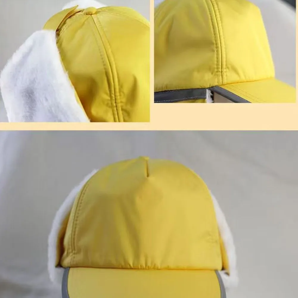 قبعة شتوية للطلاب باللون الأصفر مبطنة بالصوف مادة قطنية دافئة قبعة قطنية لحماية الأذن شرائط عاكسة قبعة حماية الأذن