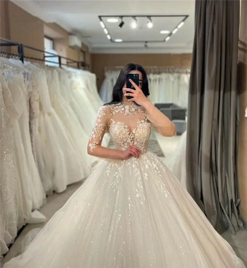 Elegante abito da sposa scintillante in pizzo a maniche lunghe A-line collo alto decalcomania abito da sposa lunghezza pavimento abito personalizzazione gilet trasparente