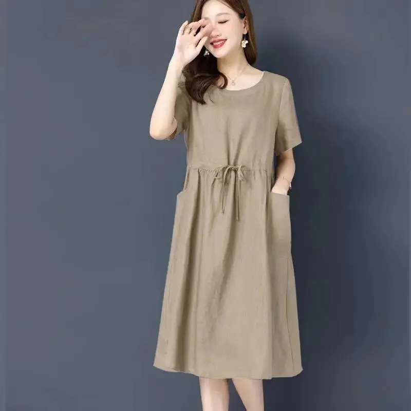 

Women's 2024 Summer New Spliced O-Neck Pocket Sashes Fashion Solid Color Loose Versatile Minimalist Casual Short Sleeved Dresses