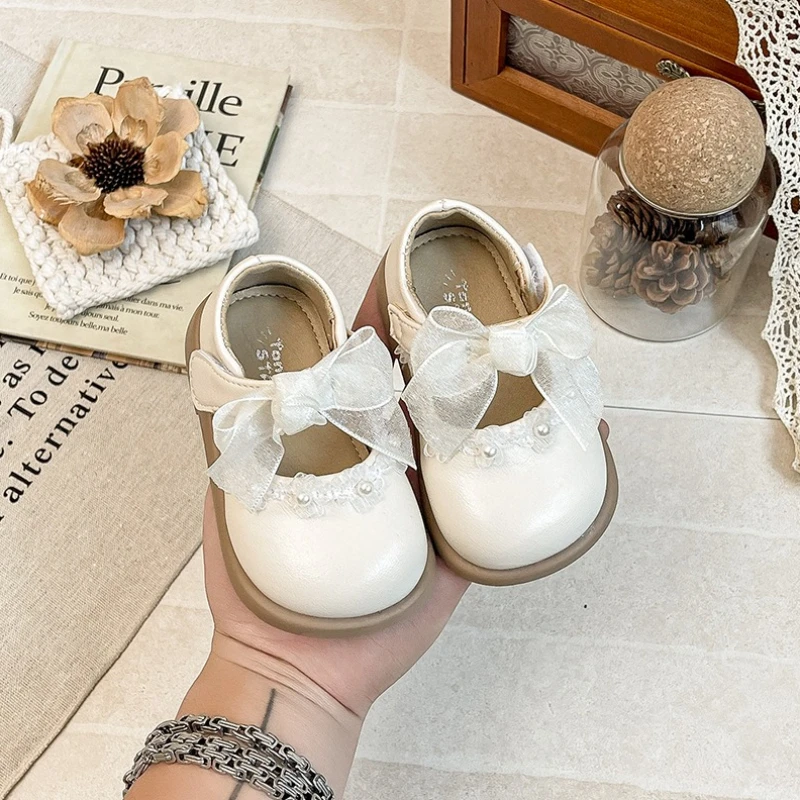 

Baby Girls Princess Leather Shoes with Ribbons Bow 2026 New Spring Toddler Mary Jane Flats Soft Sole Classic Trendy First Walker