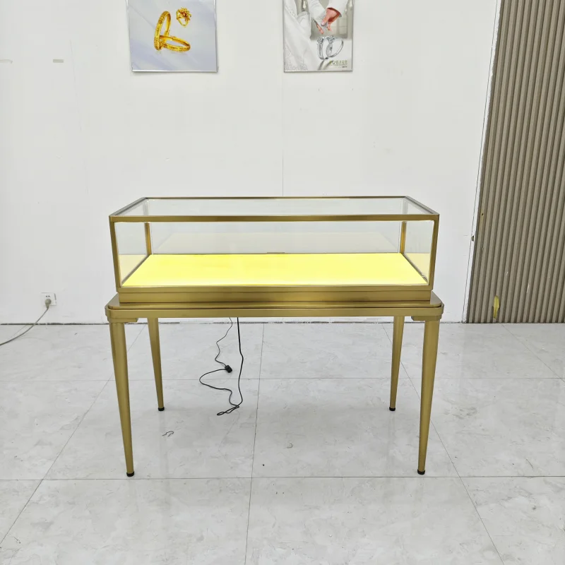 

Customize.Luxury Rectangular Glass Jewelry Display with Gold Stainless Steel and Interior Lighting