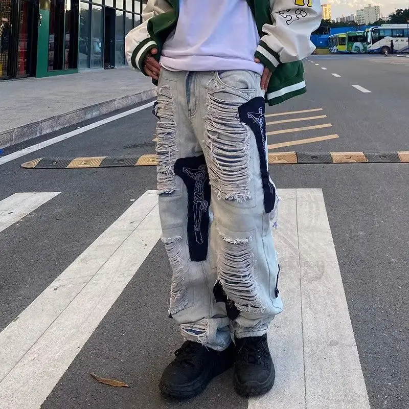 High Street Hip Hop Cuciture strappate Jeans decostruiti Design Sense Pantaloni a gamba dritta con toppa vintage Uomo Donna