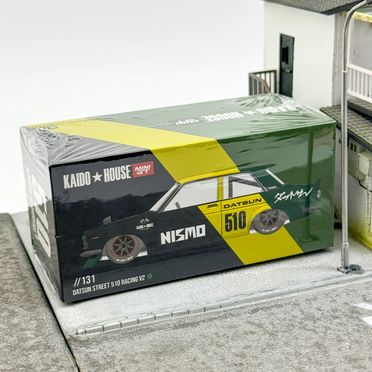 TSM KAIDO HOUSE MINIGT 1/64 KHMG131 Datsun Street 510 Racing V2 Vernis Chase Groen Geel gegoten legering automodel