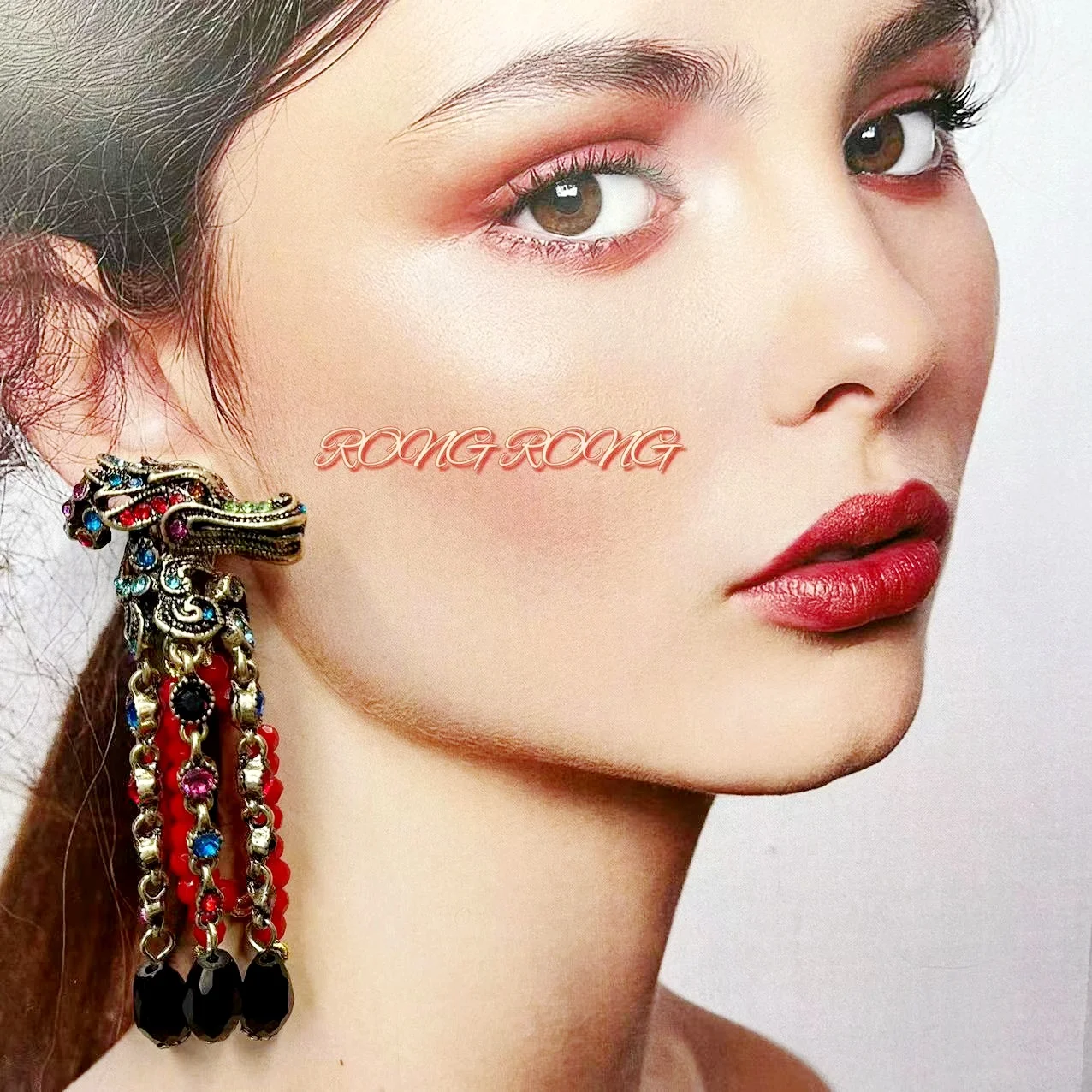 

Dragon dragon head red wheat fringe long heavy industry to do old exaggerated personality earrings