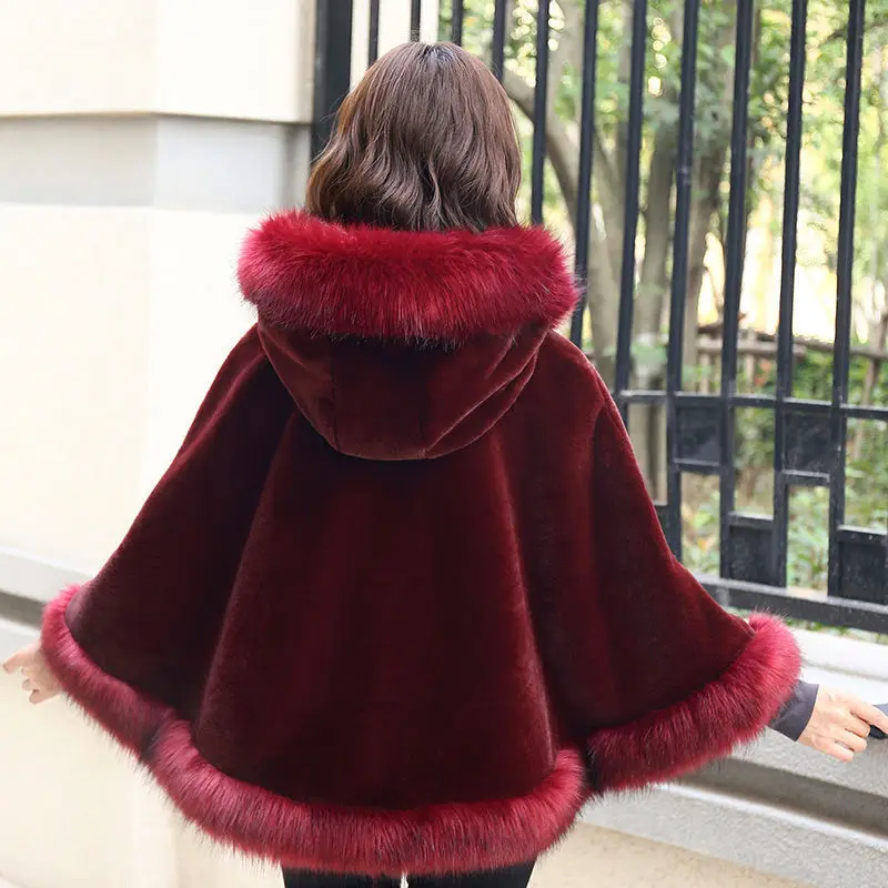 Nouvelle Cape à capuche coréenne hiver châle Outcoat fausse fourrure manteau mi-long fausse fourrure manteau à la mode et chaud pour les femmes vêtements pour femmes