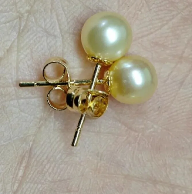 Mini natural AAA 8-9mm 9-10mmNanhai yellow pearl earrings 14K gold.