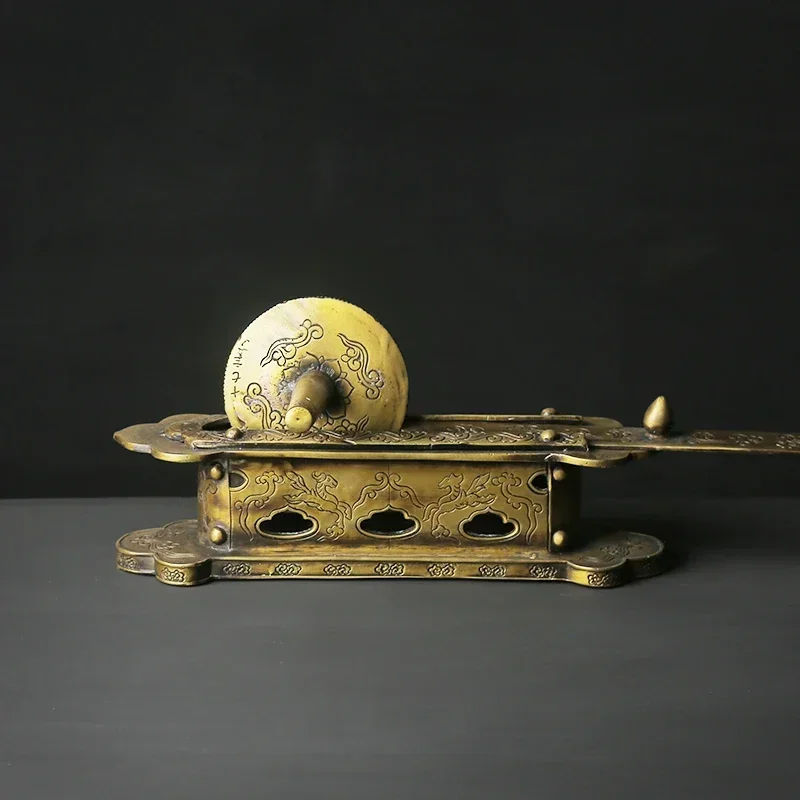 During the Yuan Dynasty, tea was imitated and carved into lotus bases. The tea mill was made into an old brass medicine