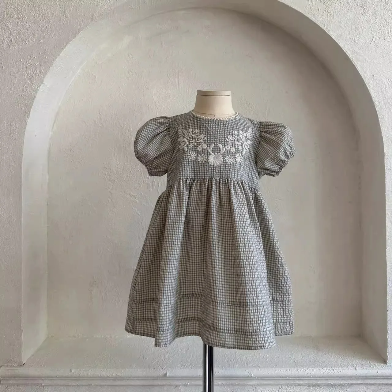 2026 New Korean Spring Girls' Princess Checkered Bubble Short Sleeved Dress Casual and Comfortable Kids Skirt