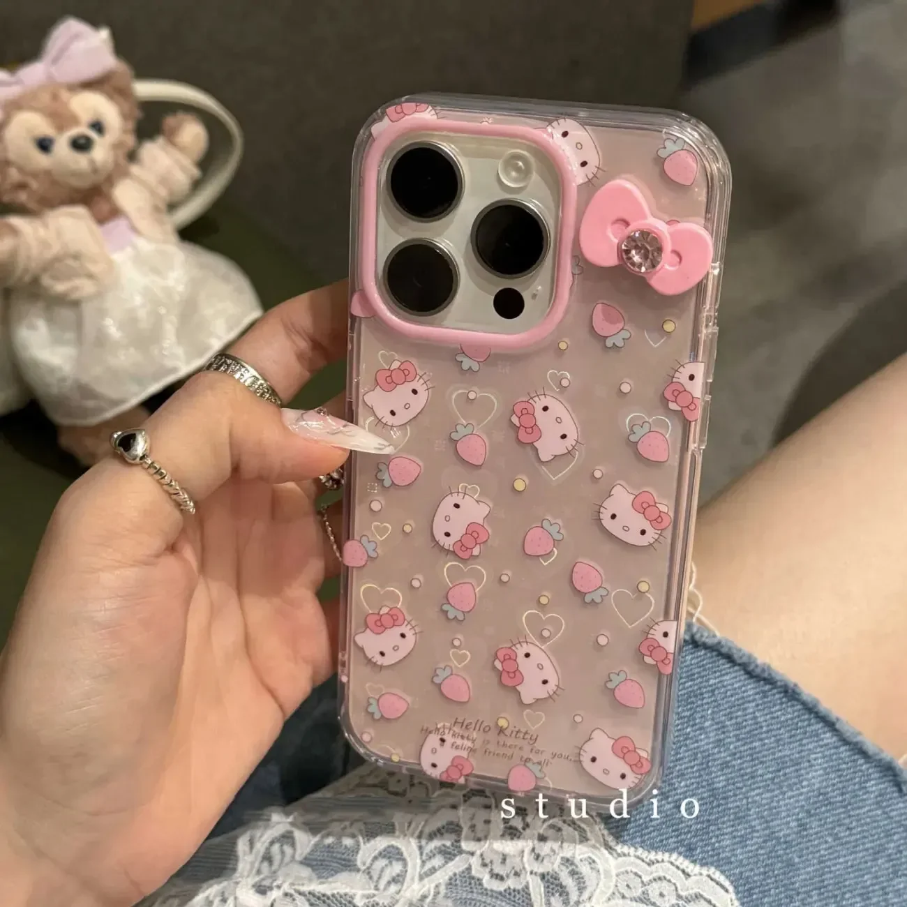 Sanrio-funda de teléfono con soporte de Hello Kitty para iPhone, carcasa con lazo láser para iPhone 16, 15, 14, 12, 13, 11 Pro Max, XR, XS MAX, 7, 8 PLUS, MINI Y2K