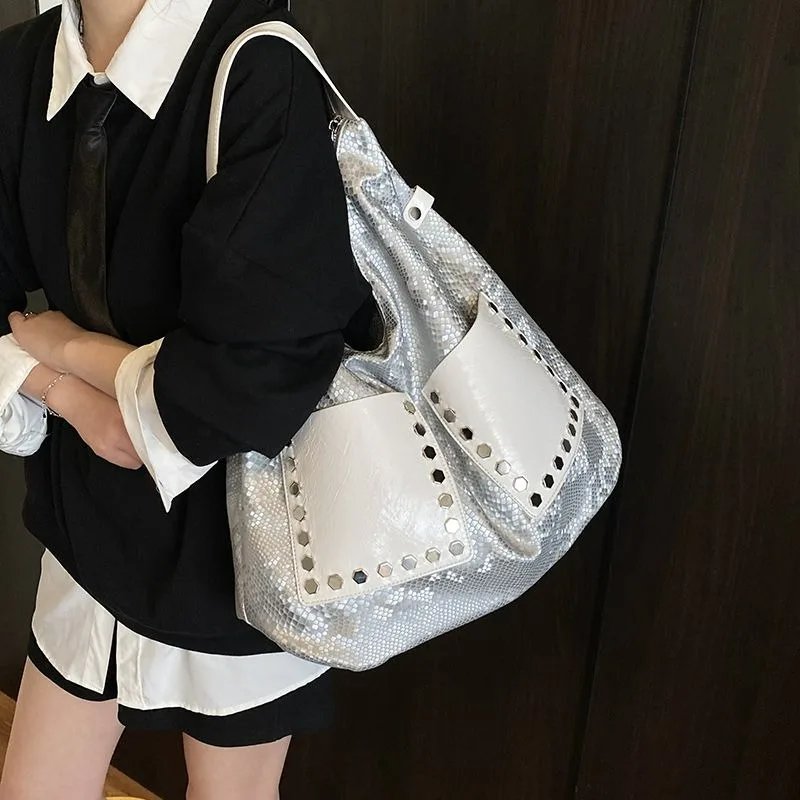 

Dark Personality Relief Handbag Locomotive Women's Tote Bag New Shoulder Messenger Bag Exquisite Fashion Trend and High Value.