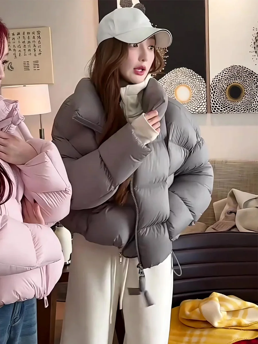المرأة ort ey down Jaet 2025 شتاء جديد 90 الأبيض دو ريشة الوقوف طوق Thiened الخبز Sle معطف غير رسمي دافئ