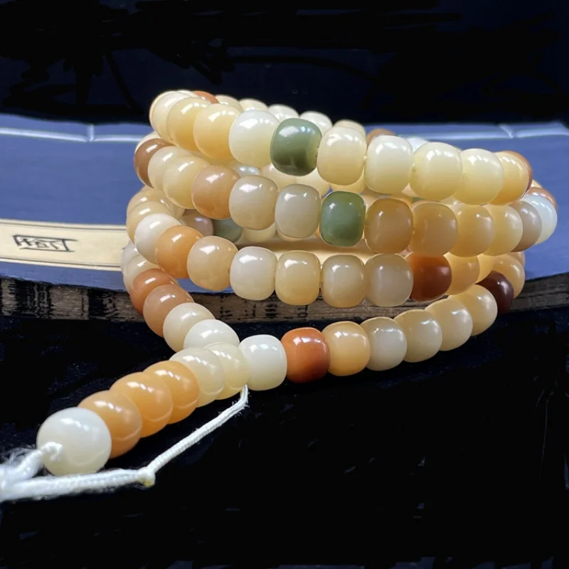 

Factory Live Supply 108High Throw Original Ecology Duobao Bodhi Root Old Barrel Beads Candy Bodhi Root Bracelet